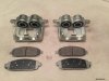 2 x zacisk hamulcowy przedni L + P + klocki Jeep Commander XK 2005-2010 5143692AA,  5143693AA,  5080868AA